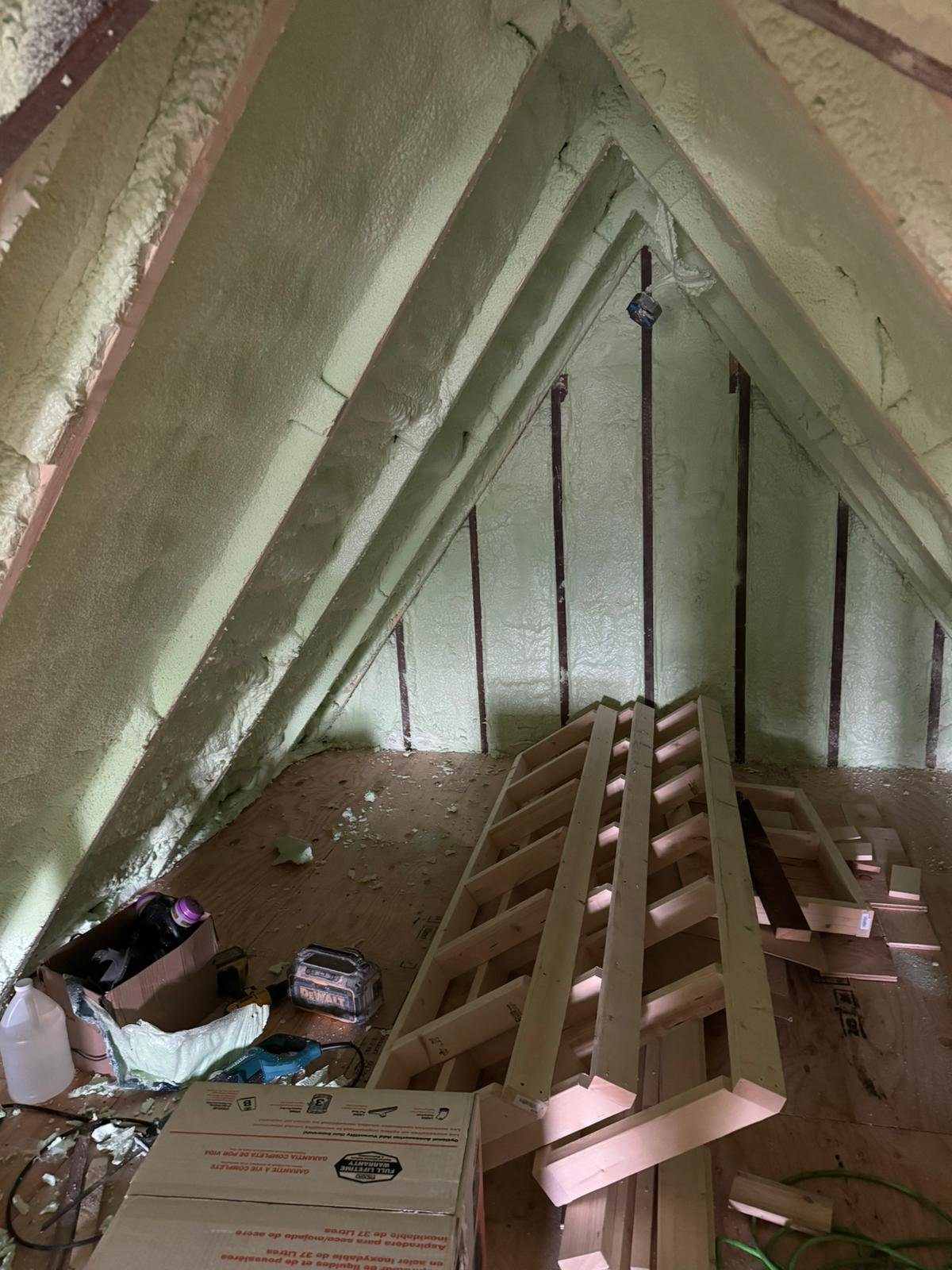 Spray-applied insulation in an attic